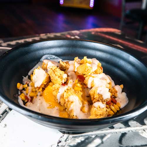 Bowl of chicken and mashed potatoes