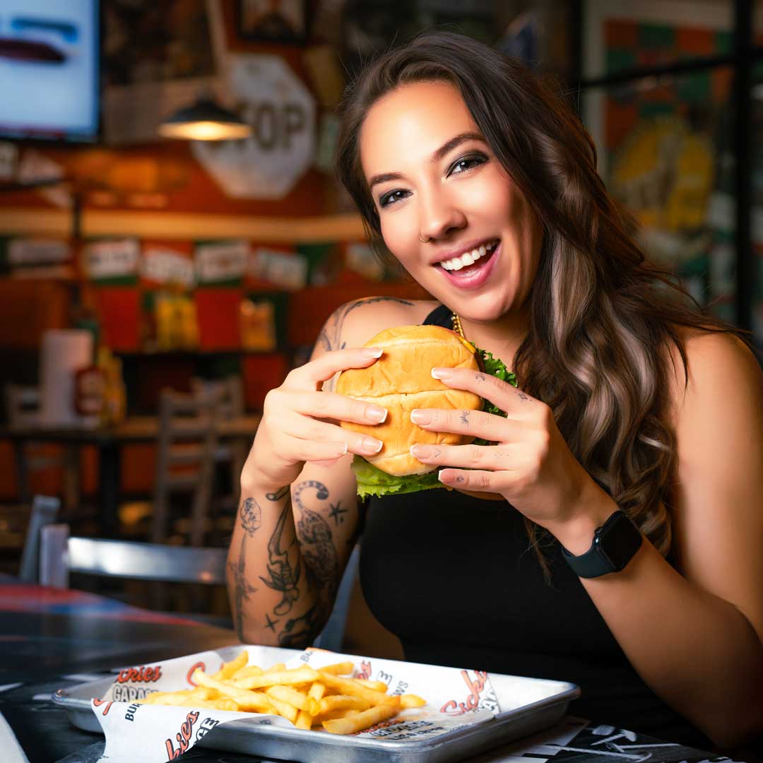 Woman eating a burger